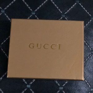 Men’s Gucci Bi-Fold Wallet.